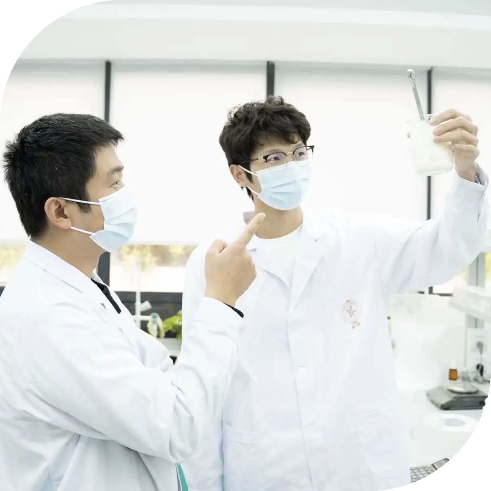 Scientists studying plant extracts